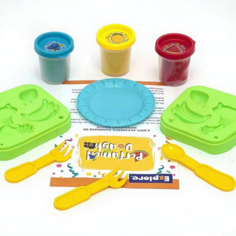 Set of play dough with tools and containers on a white background